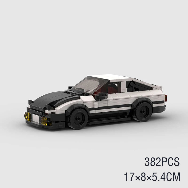 A black and white classic rally car building block set with a red interior.