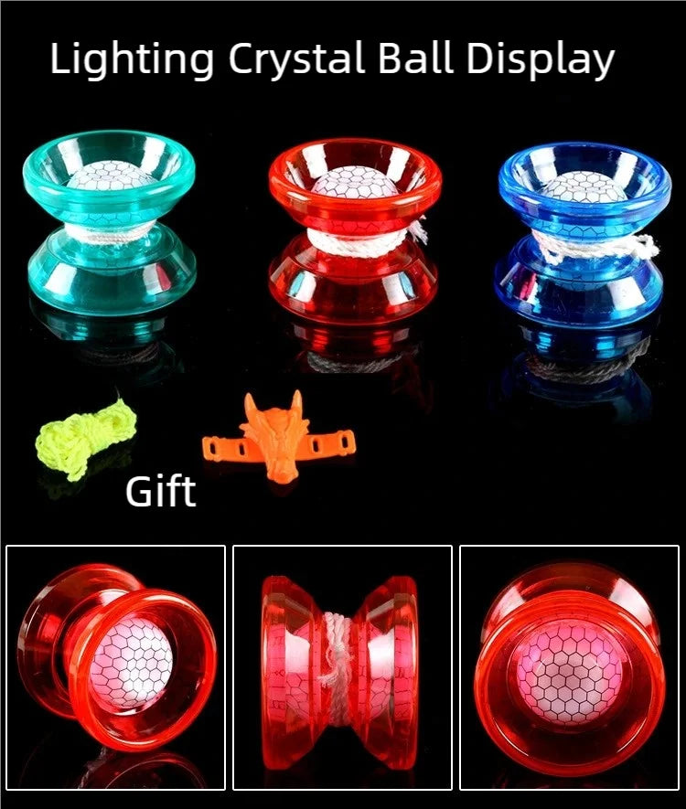 A display of four glowing crystal balls in various colors, including green, red, blue, and pink.