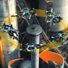 A K500 MAX circular flight one-key simple operation fighter plane is shown in flight against an industrial background.