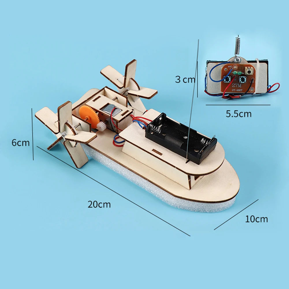 A wooden paddle boat model with a motor and electronic components, shown with various dimensions.