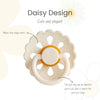 A white natural latex baby pacifier with a flower shape and a pull ring for adjusting the anti-lost chain.