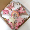 Handmade felt butterfly crib mobile featuring pink, white, and tan felt shapes like clouds and rainbows