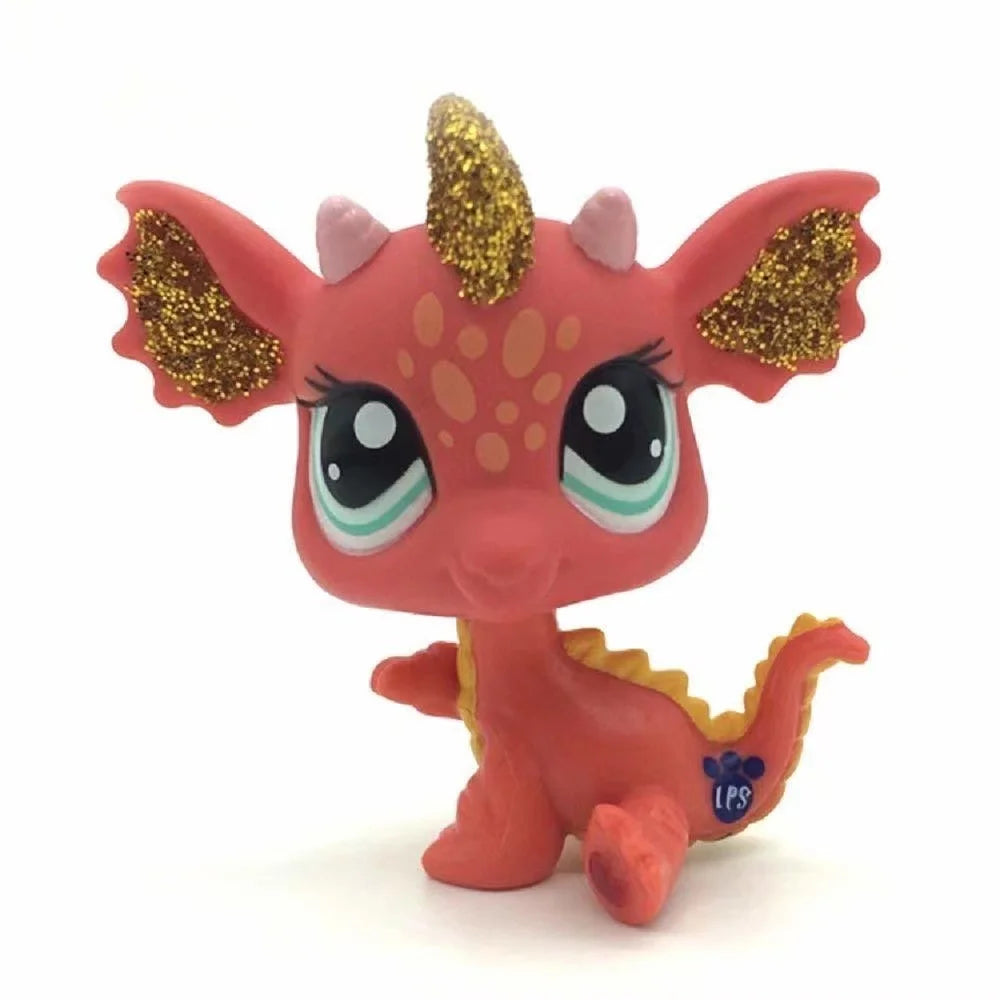 A small, pink Littlest Pet Shop style standing dog figure with gold accents.