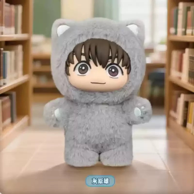 A plush blind box pendant shaped like a cat with dark hair and large eyes, covered in soft gray fur.