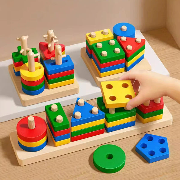 Natural wooden Montessori building blocks in various colors and shapes arranged on a light wood surface.