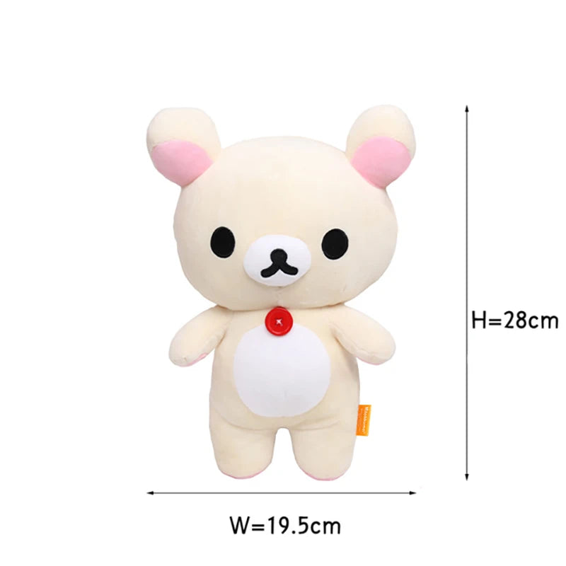 A soft, light beige Rilakkuma anime plush bear with pink accents and a white belly.