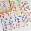 A collection of wooden number matching puzzles featuring numbers 1 through 10, with colorful designs and various colors.