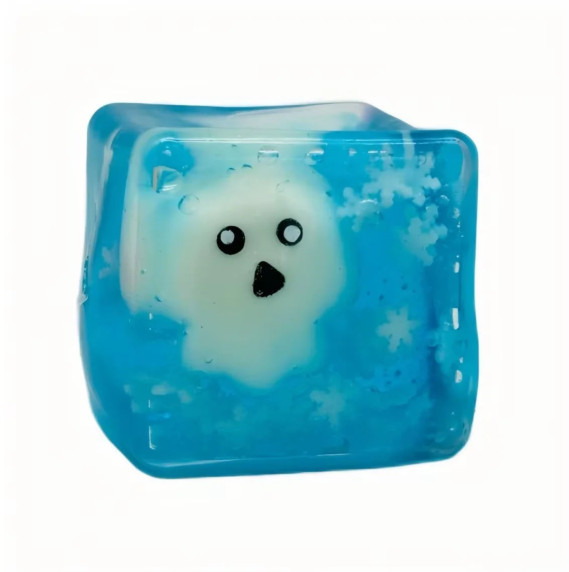 A translucent blue squishy toy shaped like a ghost with white features and snowflake details.