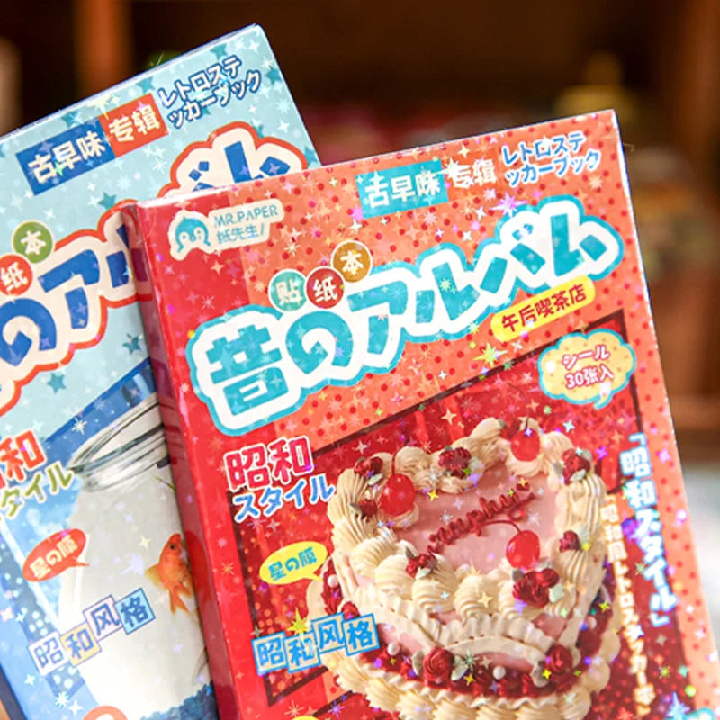 A close-up of a red box of Japanese vintage kawaii stickers for scrapbooking and journaling