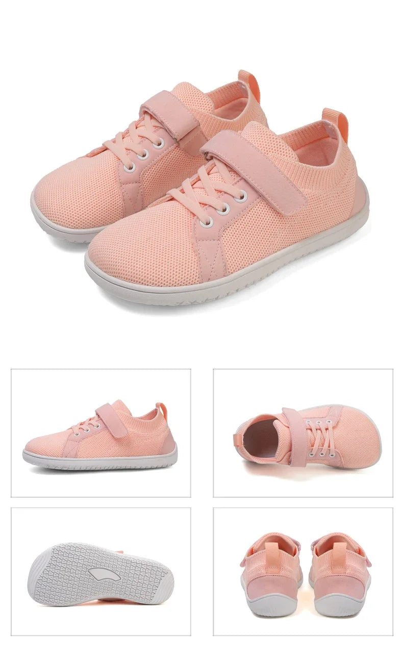 Pink knitted minimalist sneakers for kids shown from the side and top view.