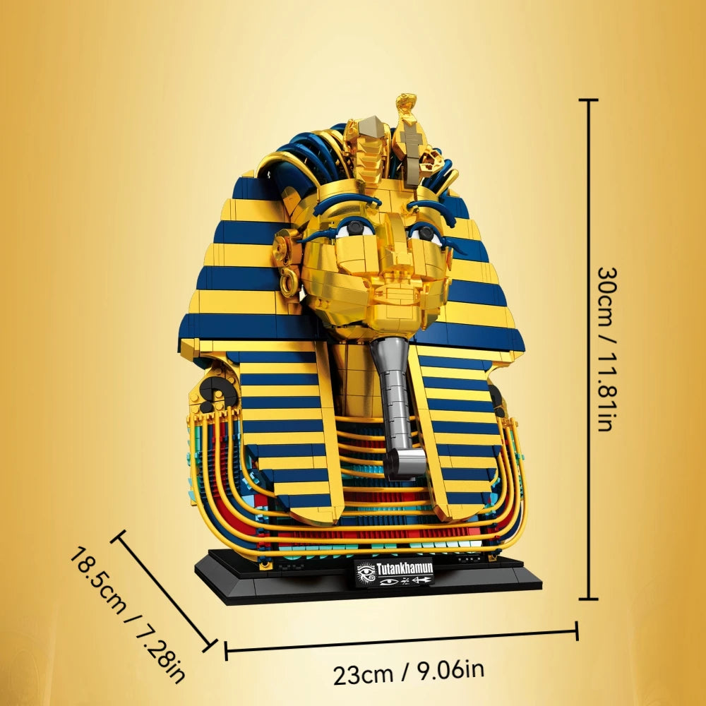 A detailed model of an Egyptian Pharaoh golden mask built from building blocks, featuring blue and yellow stripes.