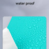 A close-up of a teal rubber plate showing waterproof features and small water droplets.