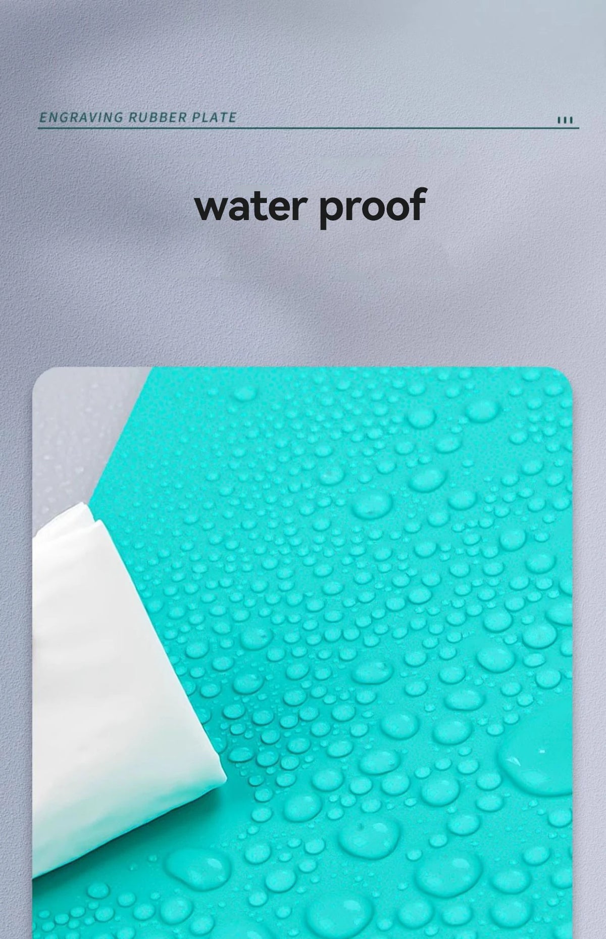 A close-up of a teal rubber plate showing waterproof features and small water droplets.