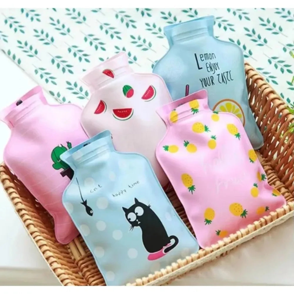 A collection of pink and blue portable hot water bottles with cozy covers are displayed in a woven basket.