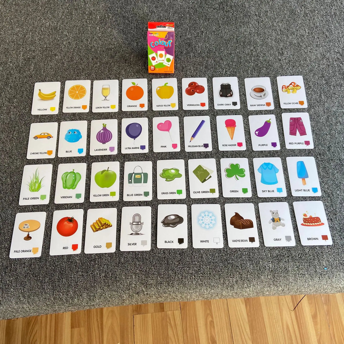 A collection of colorful early learning flash cards featuring various shapes, colors, animals, and objects.
