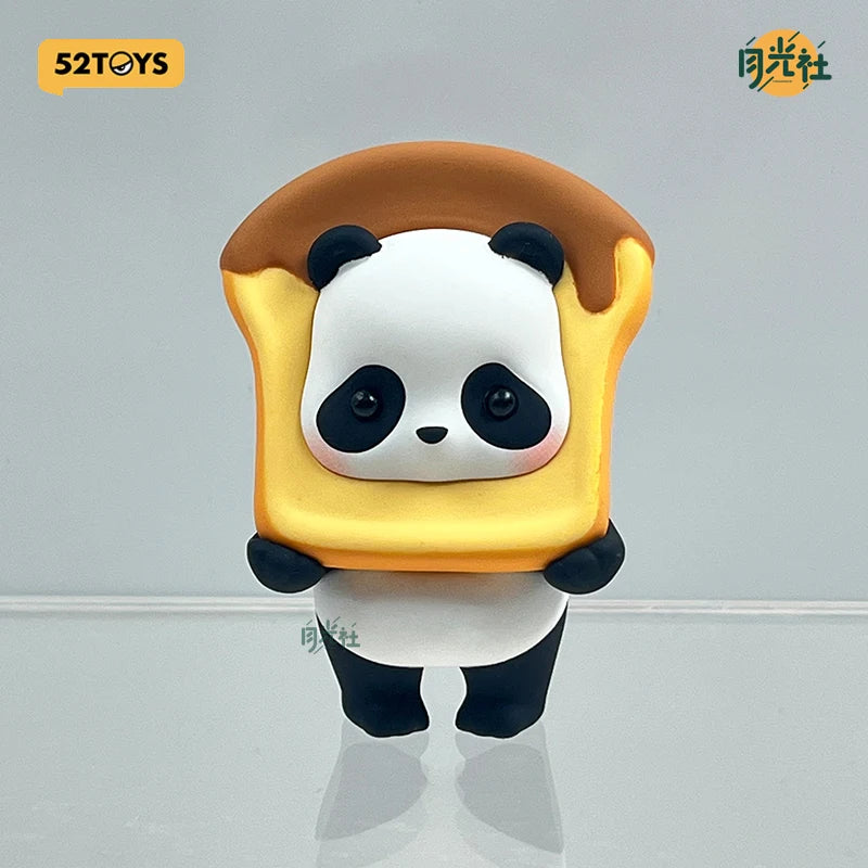 A collectible figure of a panda wearing a yellow blind box-style hat.