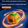 An orange and green ball fidget toy is shown rotating rapidly, illustrating a smooth spiral motion for stress relief.