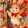 A fluffy brown rabbit with large ears is featured in a vibrant autumn scene surrounded by red and orange leaves.
