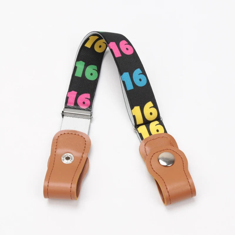 A kids canvas belt with elastic stretch featuring the number 16 printed on a black and multi-colored strap.