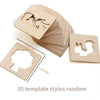A stack of wooden drawing stencils featuring various animal and abstract shapes.