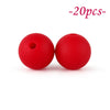 Two bright red silicone beads are shown against a white background.