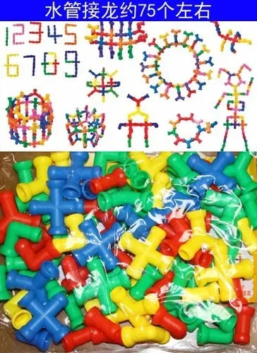 A large assortment of colorful plastic snowflake building blocks in various colors like yellow, red, green, and blue.