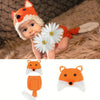 Handmade crochet fox costume for baby photography featuring an orange and white fox head and body.