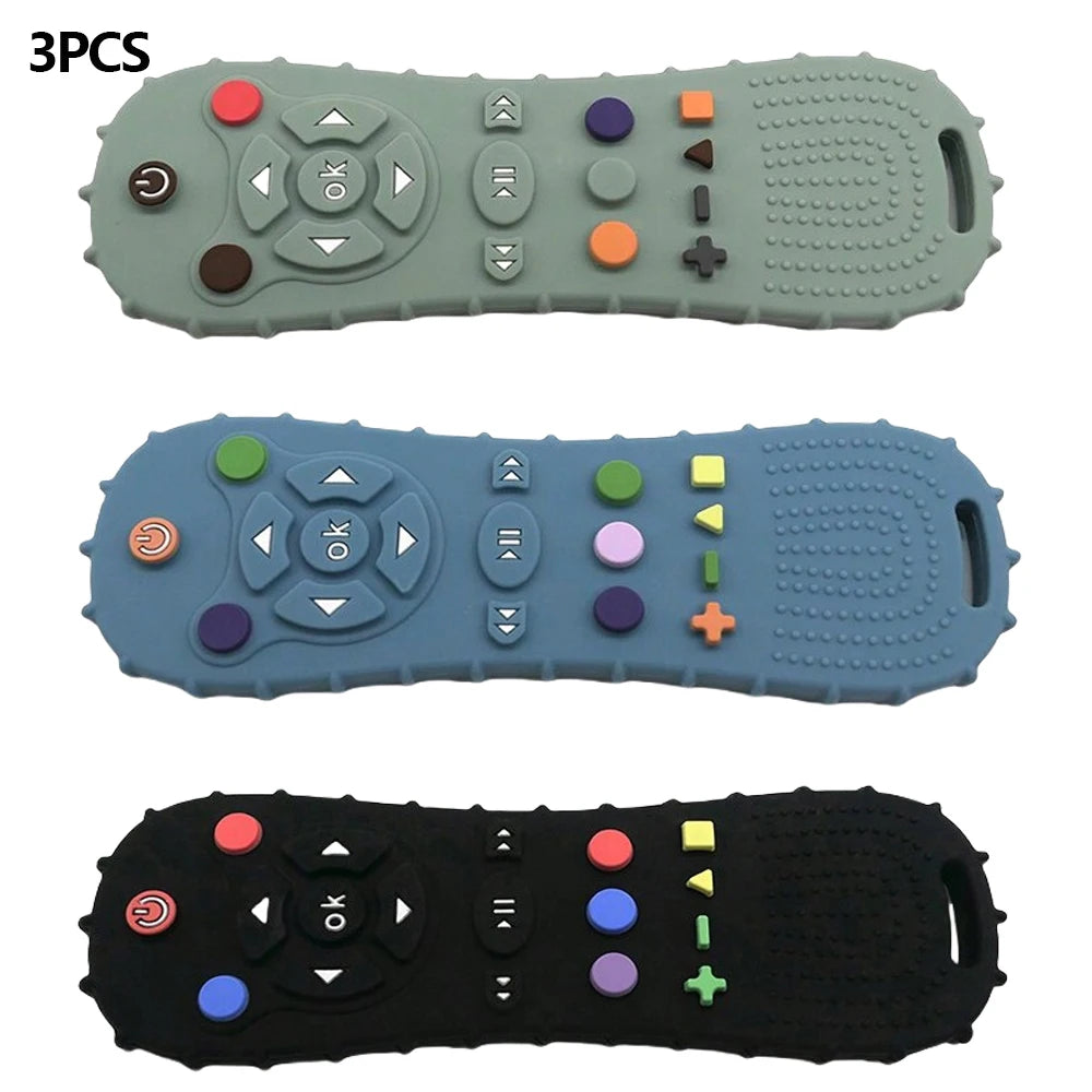 Three silicone chew toys shaped like remote controls in green blue and black.