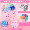 A collection of mixed color resin beads in various shades and sizes are displayed in plastic grids for DIY jewelry technology