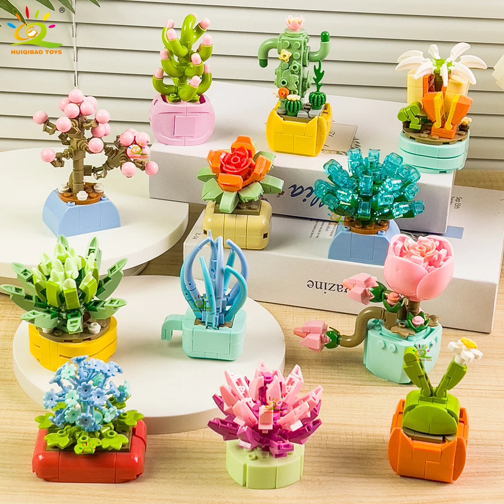 A collection of colorful DIY flower succulent building blocks and desktop plant decor in various pots.