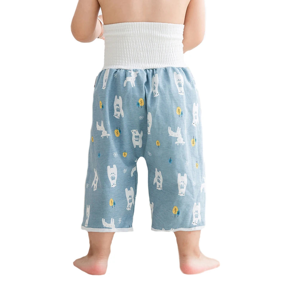 Light blue waterproof baby diaper pants with a white elastic waistband and a cute dog print.