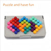 A tray of colorful plastic beads arranged in a pyramid shape, used for a puzzle and fun.