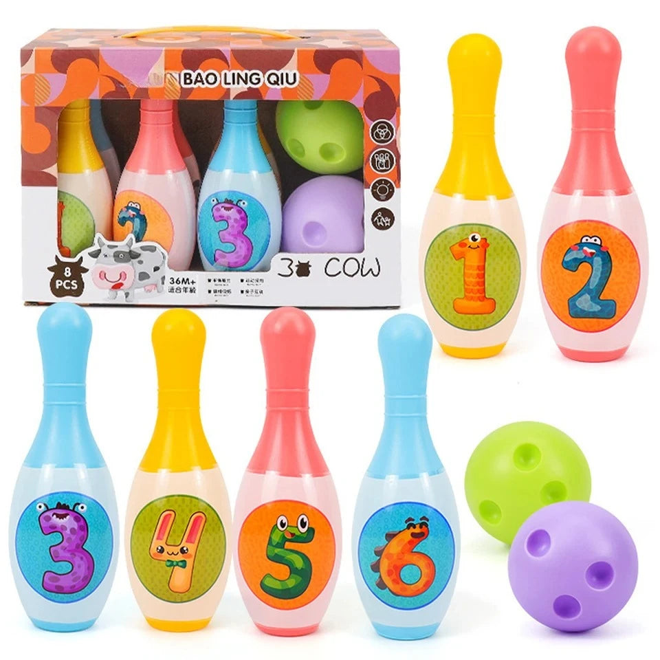 A set of soft foam bowling pins featuring numbers and animal designs, including pins numbered 3, 1, 2, 4, 5, and 6.