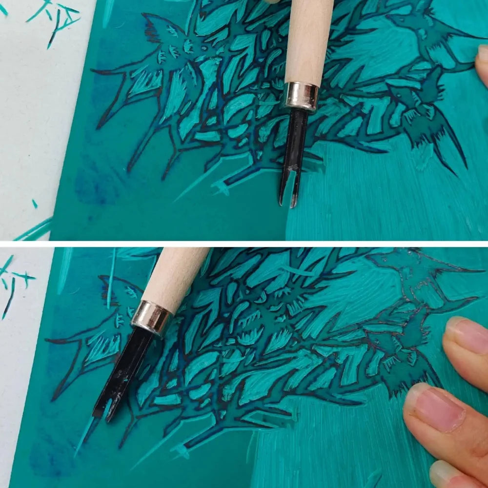 A close-up of a hand carving intricate designs into teal wood using a wooden chisel with steel blades.