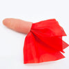 Une main tenant un tissu de soie rouge utilisé comme accessoire pour un tour de magie au doigt.