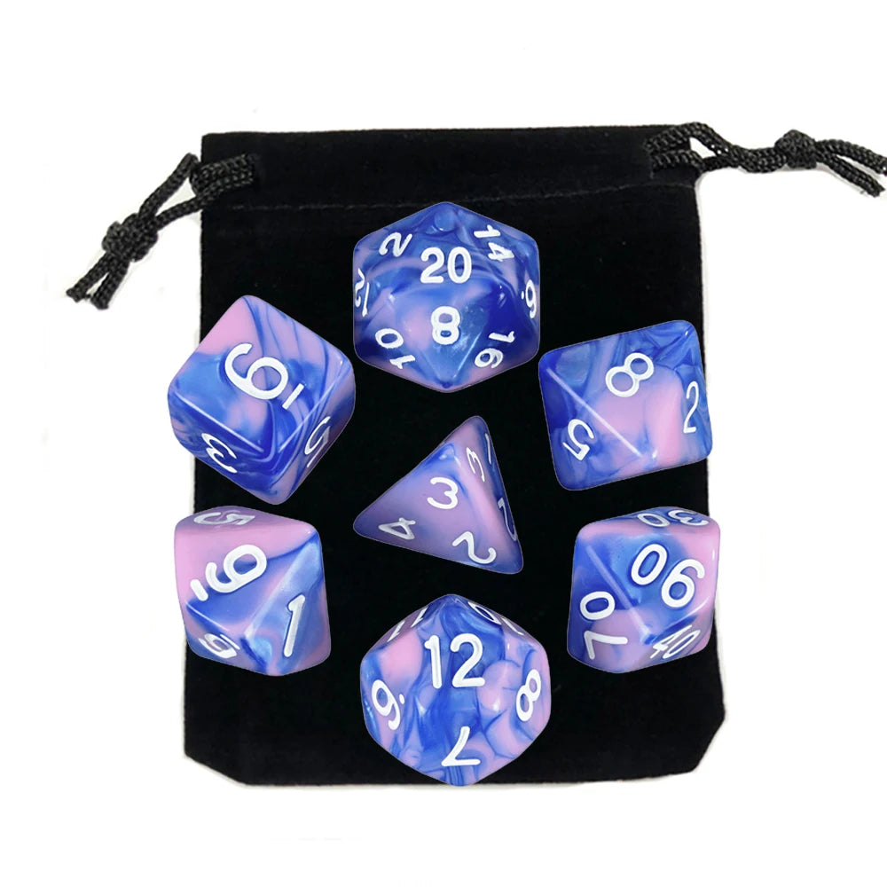 A set of twelve translucent blue and purple polyhedral dice stored in a black fabric bag.