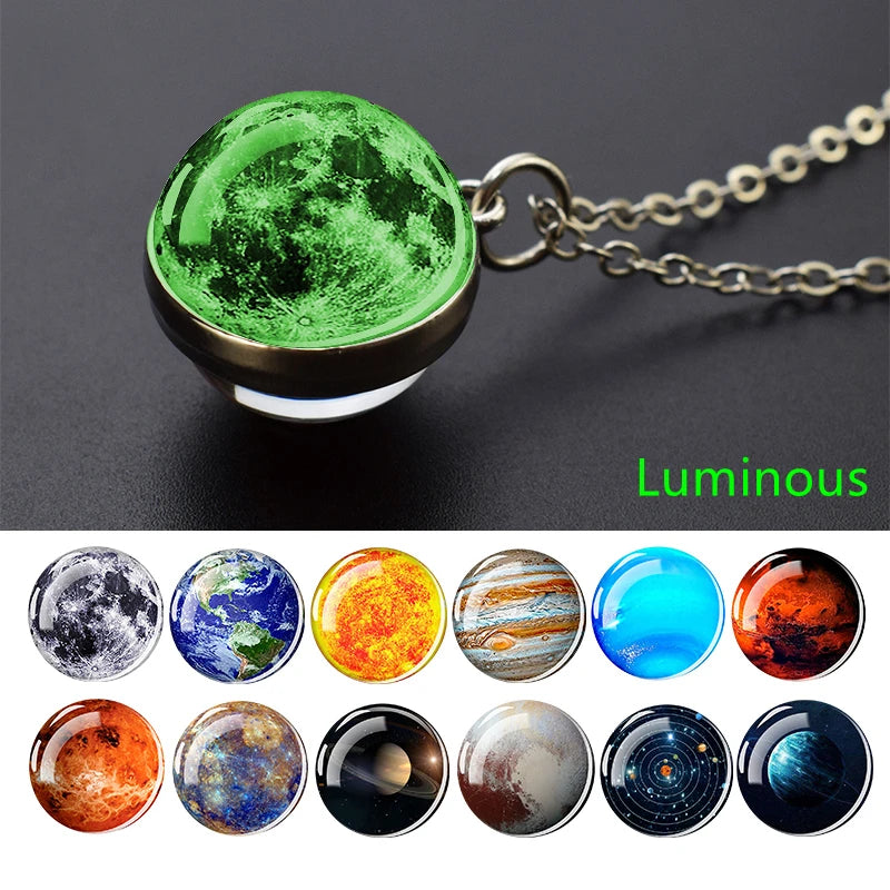 A luminous pendant necklace featuring various celestial bodies like Earth, Mars, and Jupiter on a dark background.