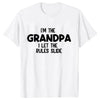 A white t-shirt with black text that reads I'm the grandpa I let the rules slide