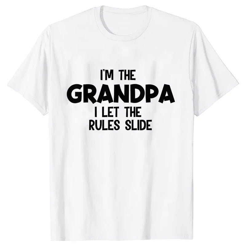 A white t-shirt with black text that reads I'm the grandpa I let the rules slide