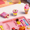 A pink plastic food set featuring various pretend foods like pudding and fruit in a tray.