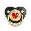Rose gold crystal bling pacifier with a heart design and gold clasp