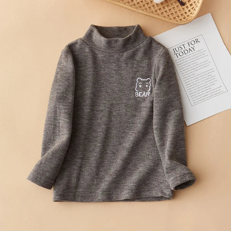A gray long sleeve shirt for kids featuring a white bear embroidery on the chest.