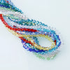 A strand of multicolor faceted glass crystal beads in various shades of blue, green, red, and yellow.