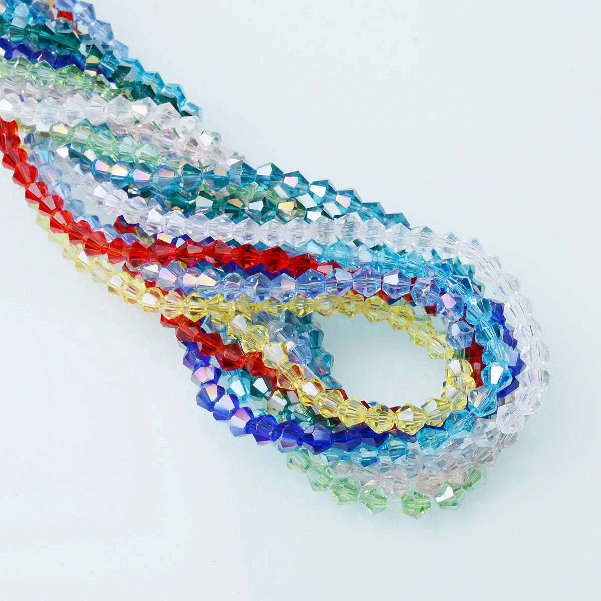 A strand of multicolor faceted glass crystal beads in various shades of blue, green, red, and yellow.