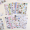 A collection of retro aesthetic stickers and craft supplies for DIY projects displayed on a light surface.