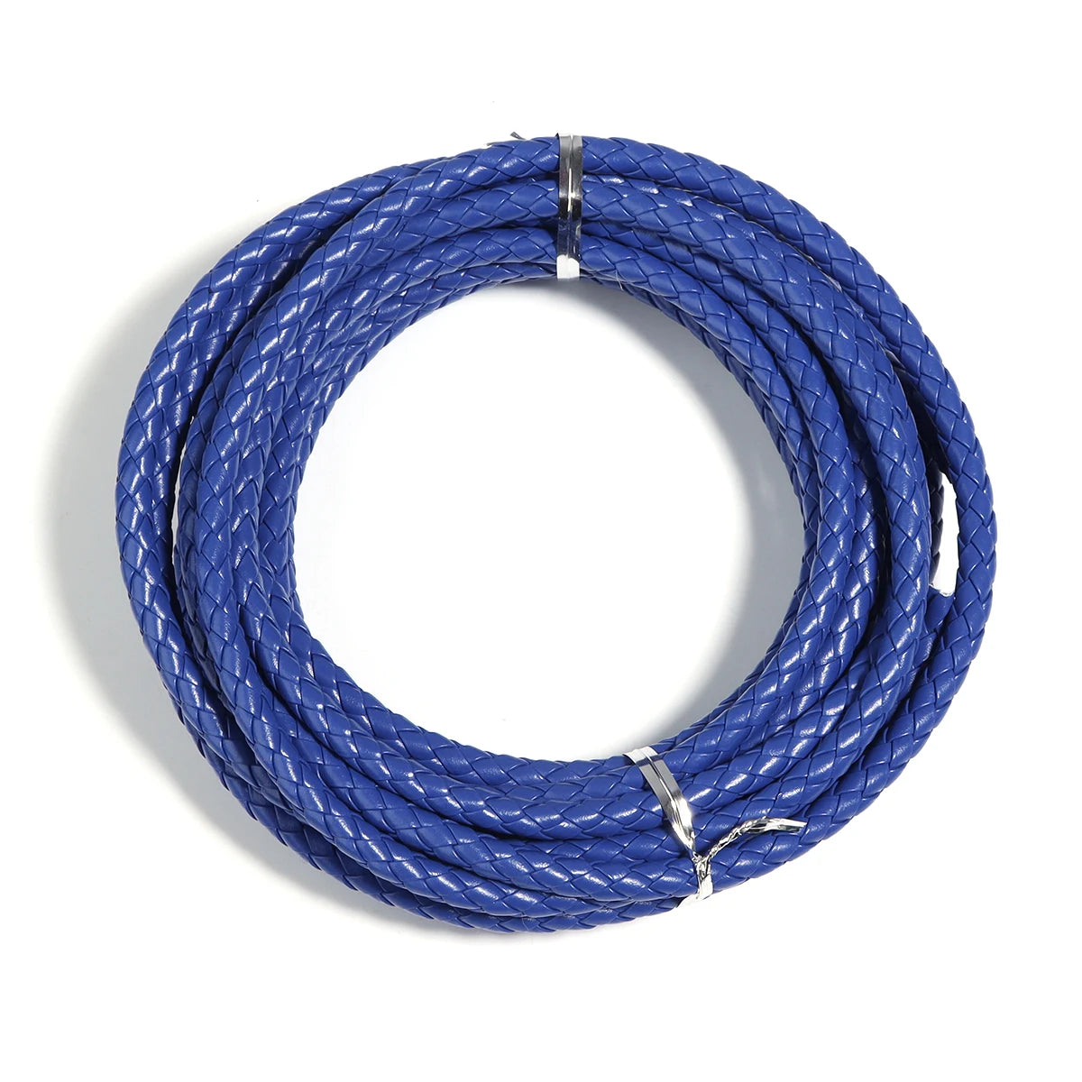 A coil of round blue braided leather cord used for jewelry making and DIY crafts.