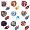 A collection of metal spinning tops and a string launcher set in various colors and designs.