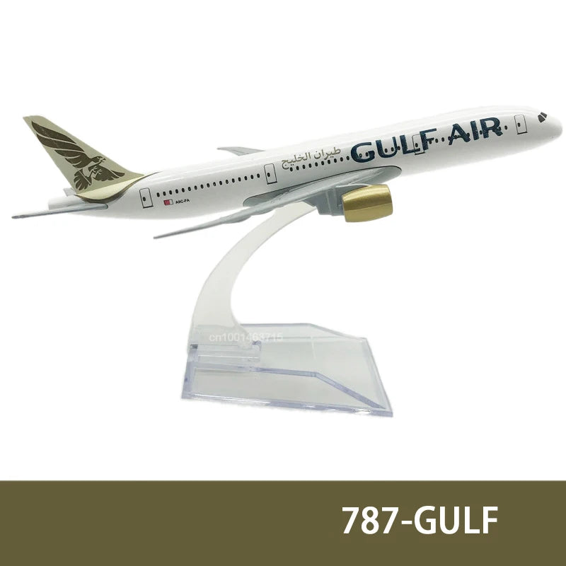 Diecast model of a Gulf Air aircraft in white with gold accents.