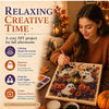 A woman is crafting a Halloween ghost and pumpkin art piece using a DIY kit with pearls and beads.