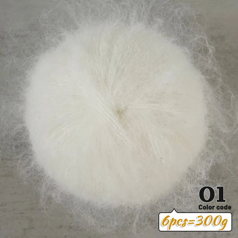 A ball of white long-haired alpaca blend yarn used for knitting, labeled as color code 01.